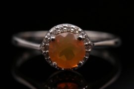 Silver ring with orange 'Buriti' opal and small white gemstones