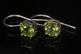 Silver earrings with green cubic zirconias