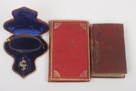 Queen Augusta Victoria - personal necklace and two books