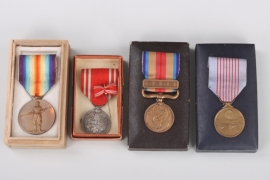 Four Japanese medals with the cases of issue