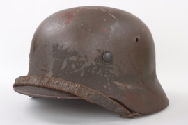 Heer M35 helmet with sand camo remainings - Q66