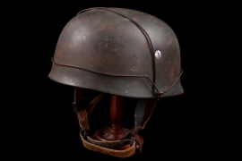 Late-war German M38 Paratrooper combat helmet with period applied bailing wire