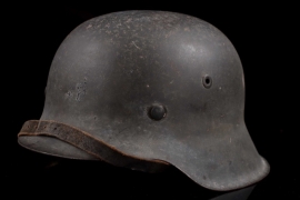 M42 Heer ex-white-wash camouflage combat helmet, « Battle of the Bulge »