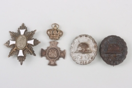 Four awards: German Field Badge of Honor, Marksmen's Medal and two Wounded Badges