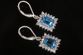 Silver earrings with blue topazes