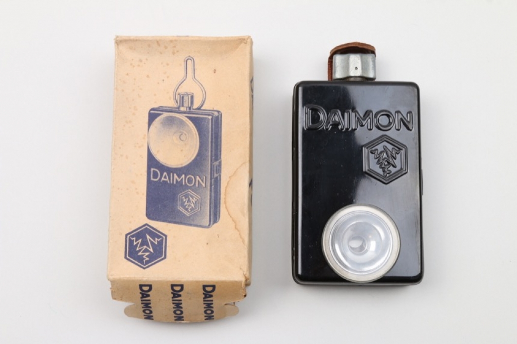 DAIMON flashlight with package