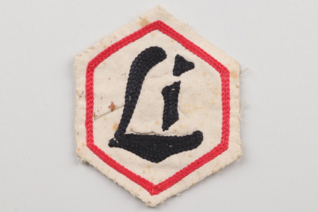 Unknown embroidered badge "Li"