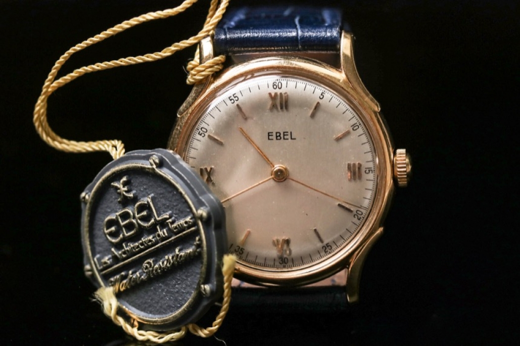 Ebel - watch with 18 kt gold case & hang tag