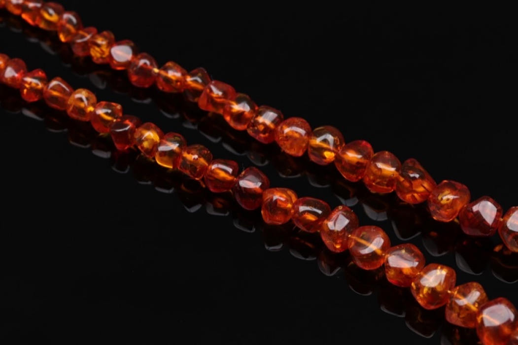 Necklace with polished amber
