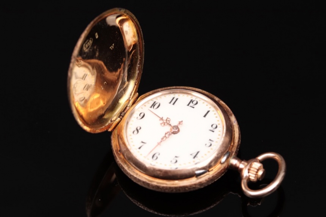 Golden pocket watch with enamel ornament