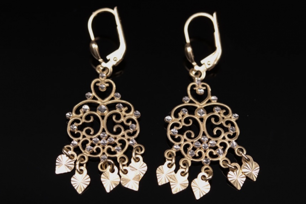 Delicate golden earrings