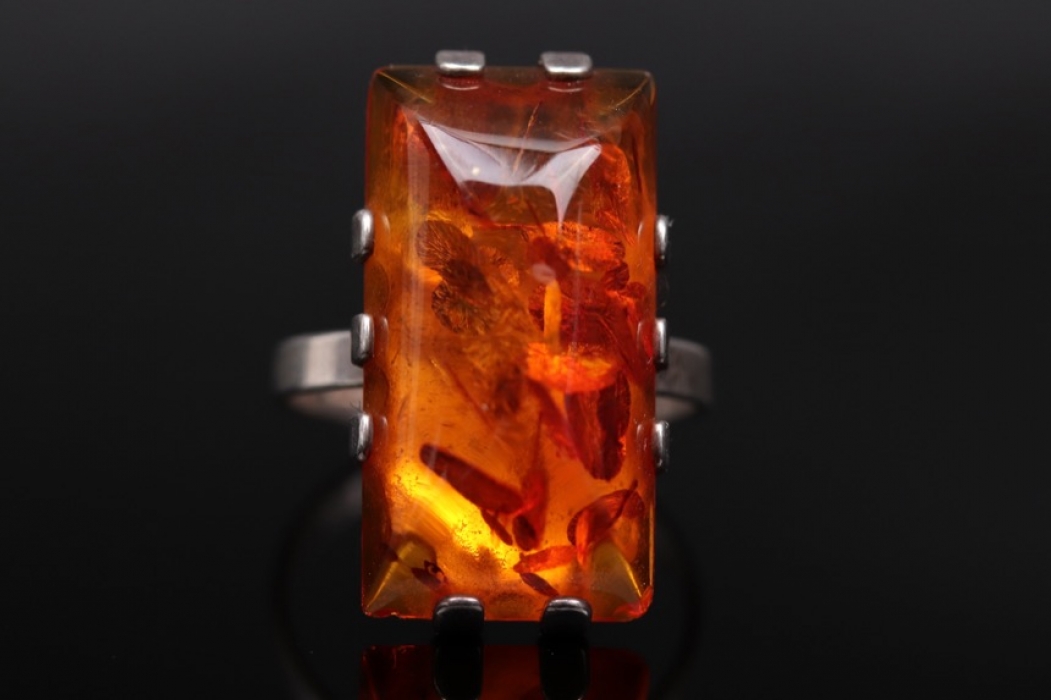 Silver ring with polished amber