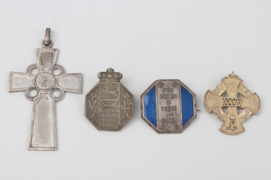 Lot of badges and one crucifix