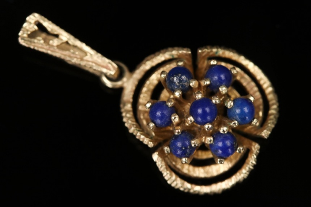 Small floral pendant with blue gems