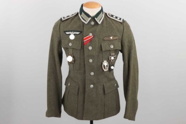 Heer infantry M43 field tunic to a German Cross in gold recipient