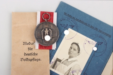 Social Welfare Medal in bag with German Red Cross service book