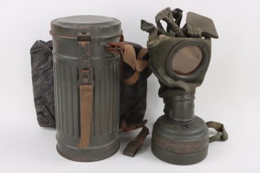 Wehrmacht gas mask with can & gas cape pouch - issued to a woman