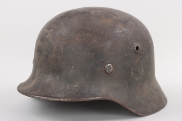 Heer M40 helmet with Shrapnel Damage