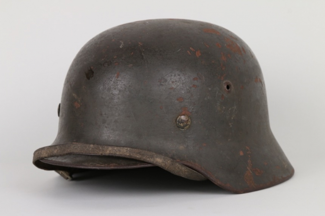 Battle damaged! Wehrmacht M40 helmet 