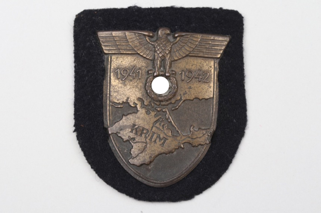 Heer Krim Shield on black cloth