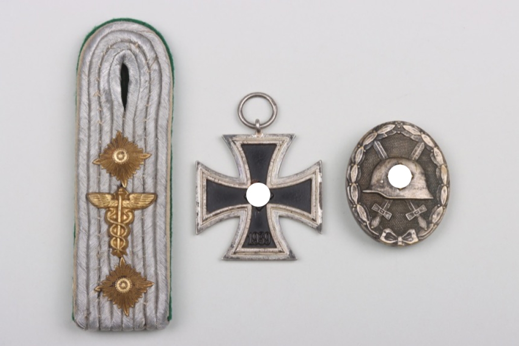 1939 Iron Cross 2nd Class, Wound Badge in Silver, and a single shoulder board