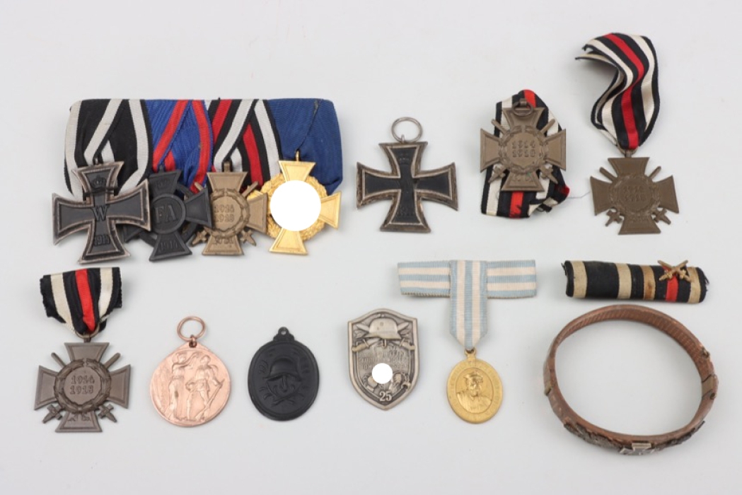 Lot of badges and a WWI bracelet