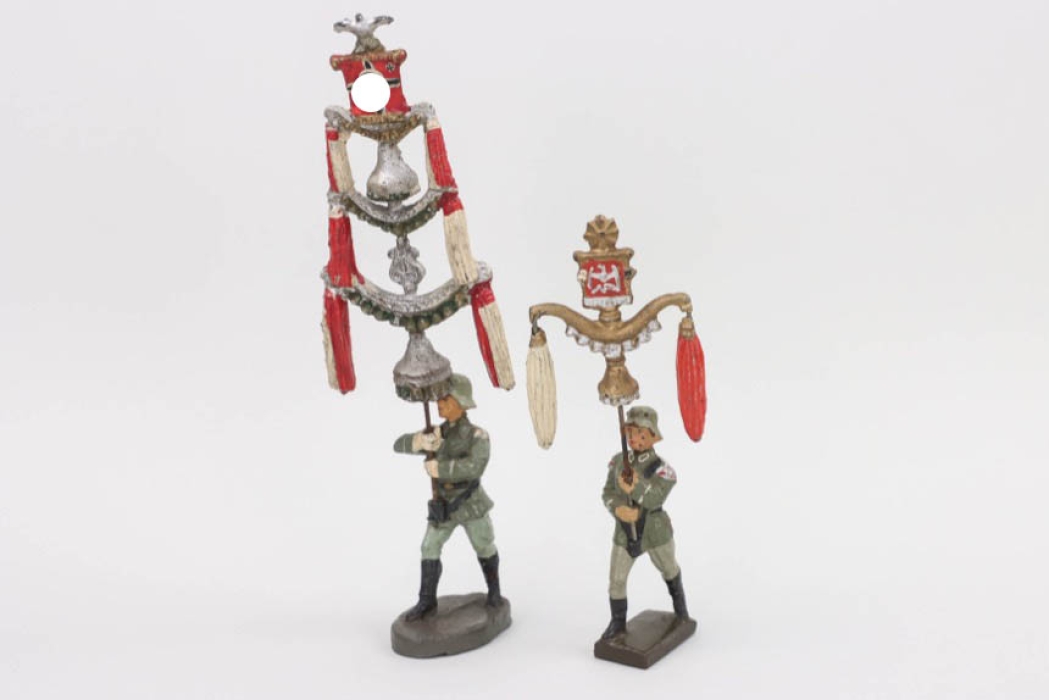 Two Wehrmacht toy figures "Schellenbaumträger" - Lineol & Elastolin