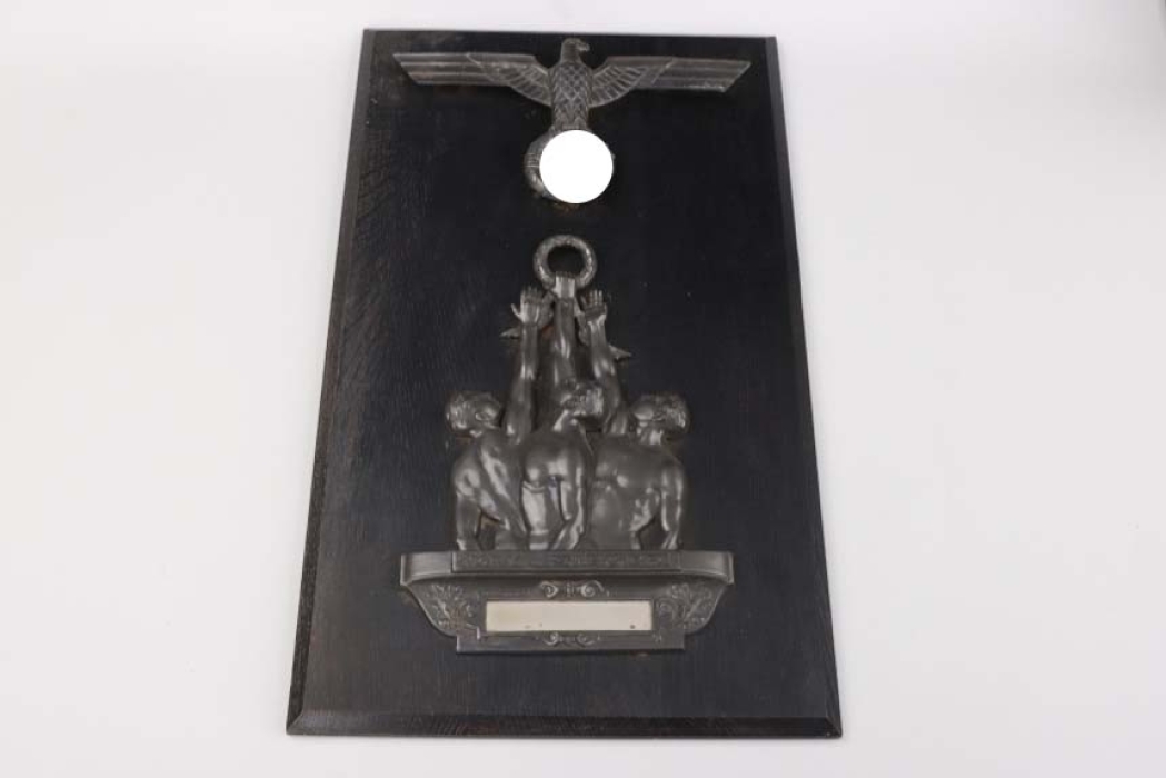 Wall relief with badge as sports prize