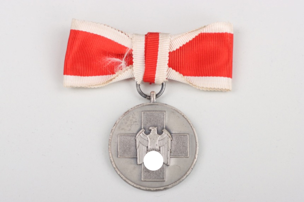 Social Welfare Medal on ribbon bow
