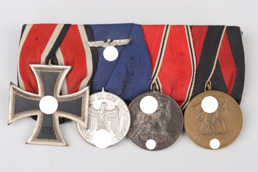 4-place medal bar with 1939 Iron Cross 2nd Class "Schinkel" type
