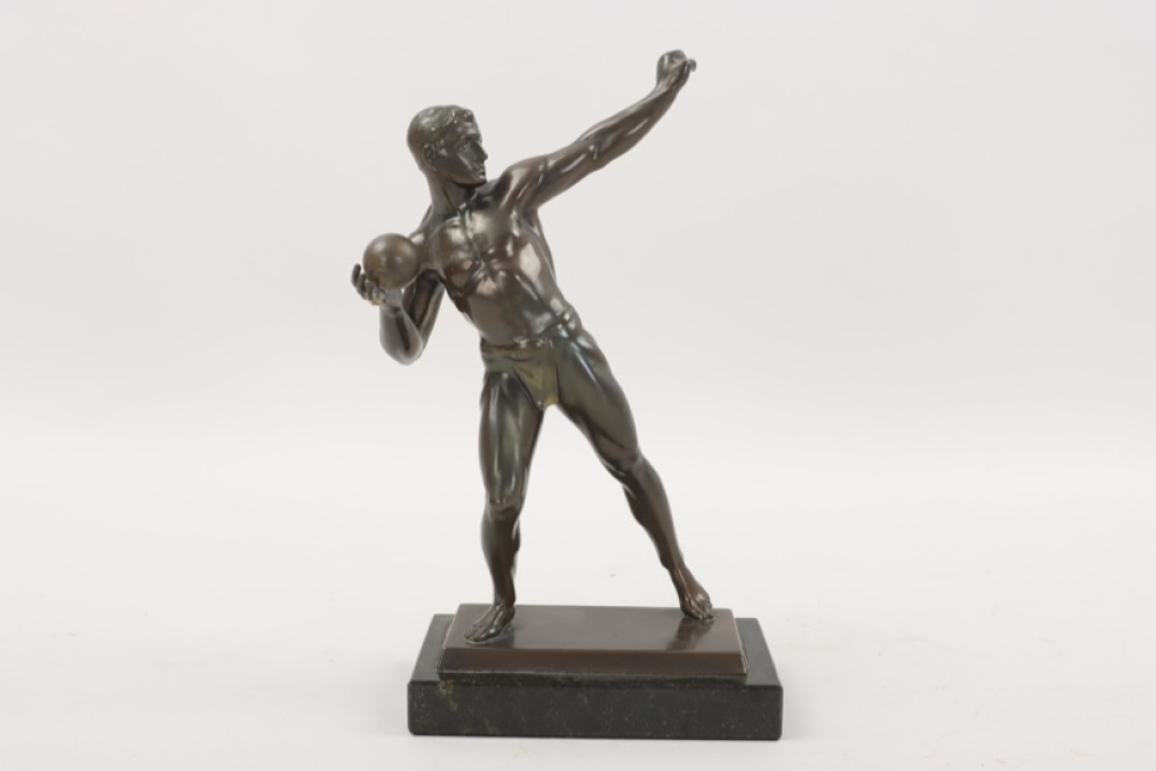 Bronzed figure "Shot putter" on black marble base