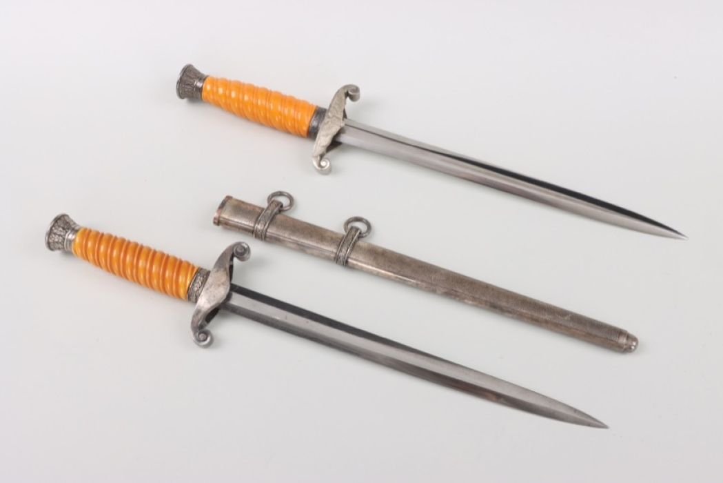 2 x denazified M35 Heer officer's daggers - Eickhorn and Spitzer