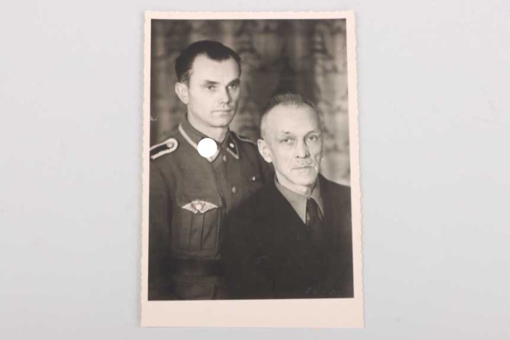Portrait photo of a Waffen-SS Unterscharführer wearing the Blood Order