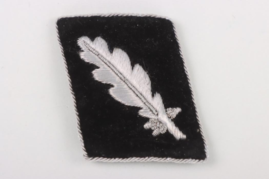 SS-Standartenführer single collar tab with RZM paper tag