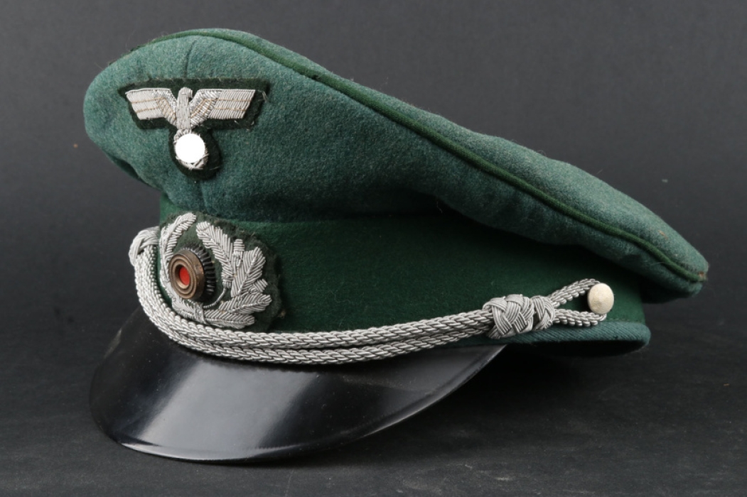 Postwar visor cap with original insignia